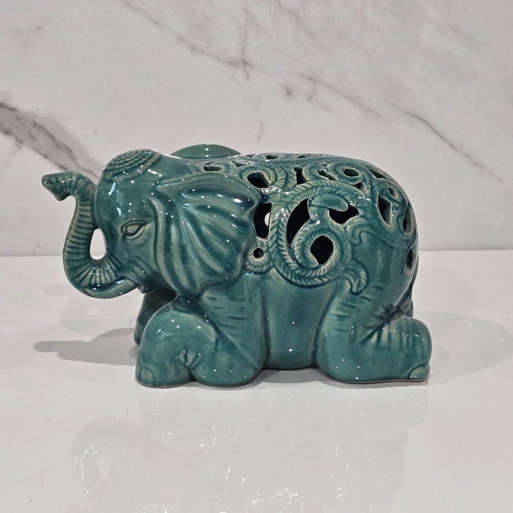 Urban Trends | Ceramic Laying Turquoise Elephant Trunk Up Good Luck